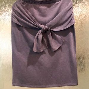 New without tags.  Never worn.  Knee length skirt with detailed tie